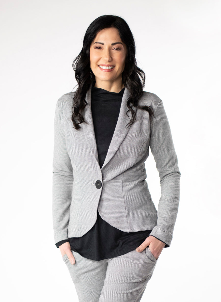 Grey and White stripe Tailored Blazer in Bamboo knit fabric with a wood button at front closure. Styled with black ribbed mock neck.