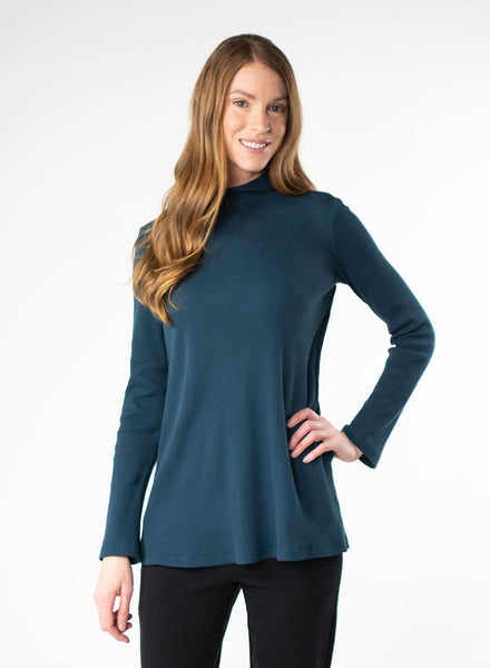 Deep Blue organic cotton waffle knit mock neck. Loose fit to the body.