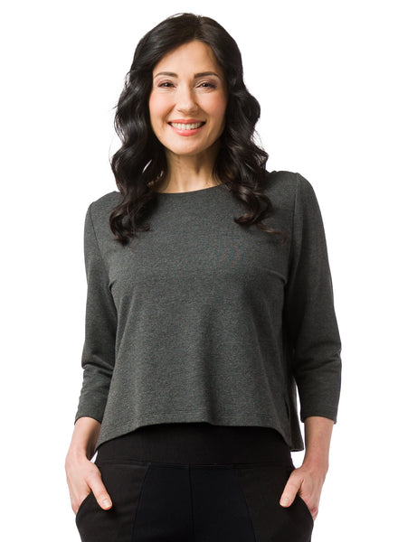 Charcoal Grey hip length top with 3/4 length sleeve. Pin tuck on shoulder seam. Bamboo and Cotton fabric. Styled with black pants