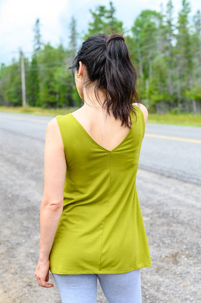 Reversible tank top with a boatneck and a v neck made from green sustainable fabric.
