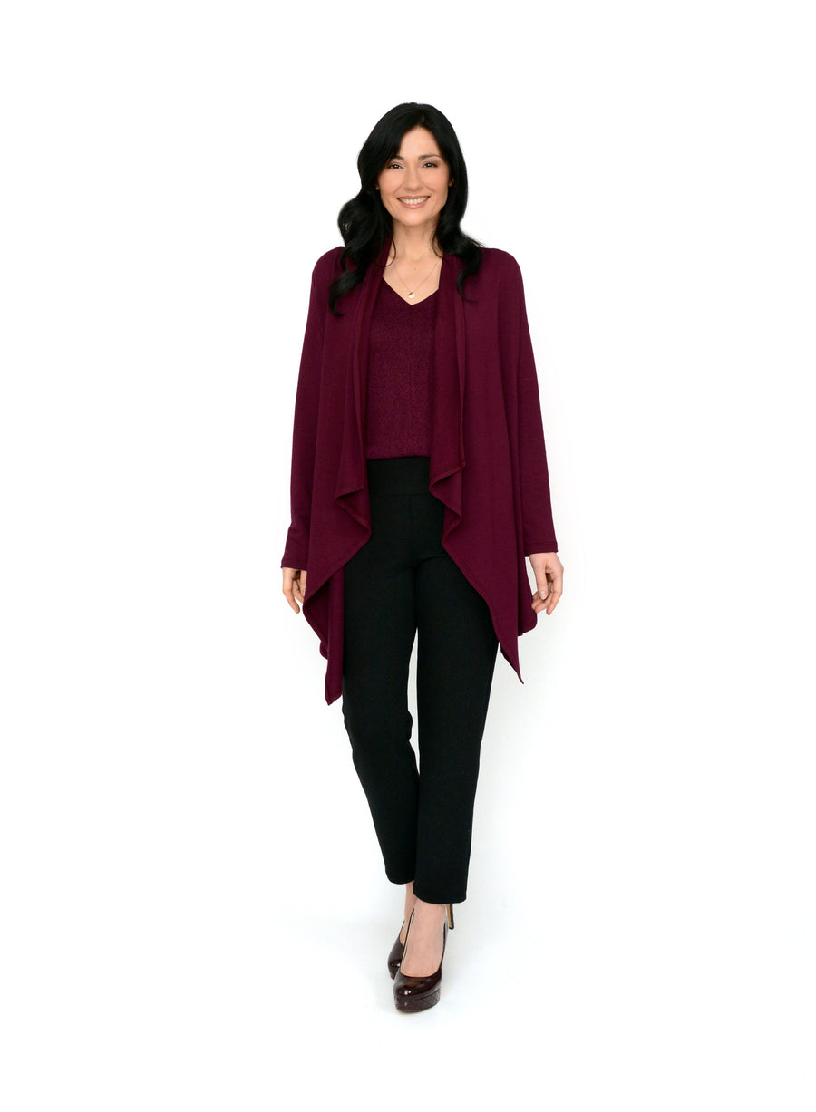 Burgundy open style cardigan with long drape in front and side seam pockets. Styled with black pants