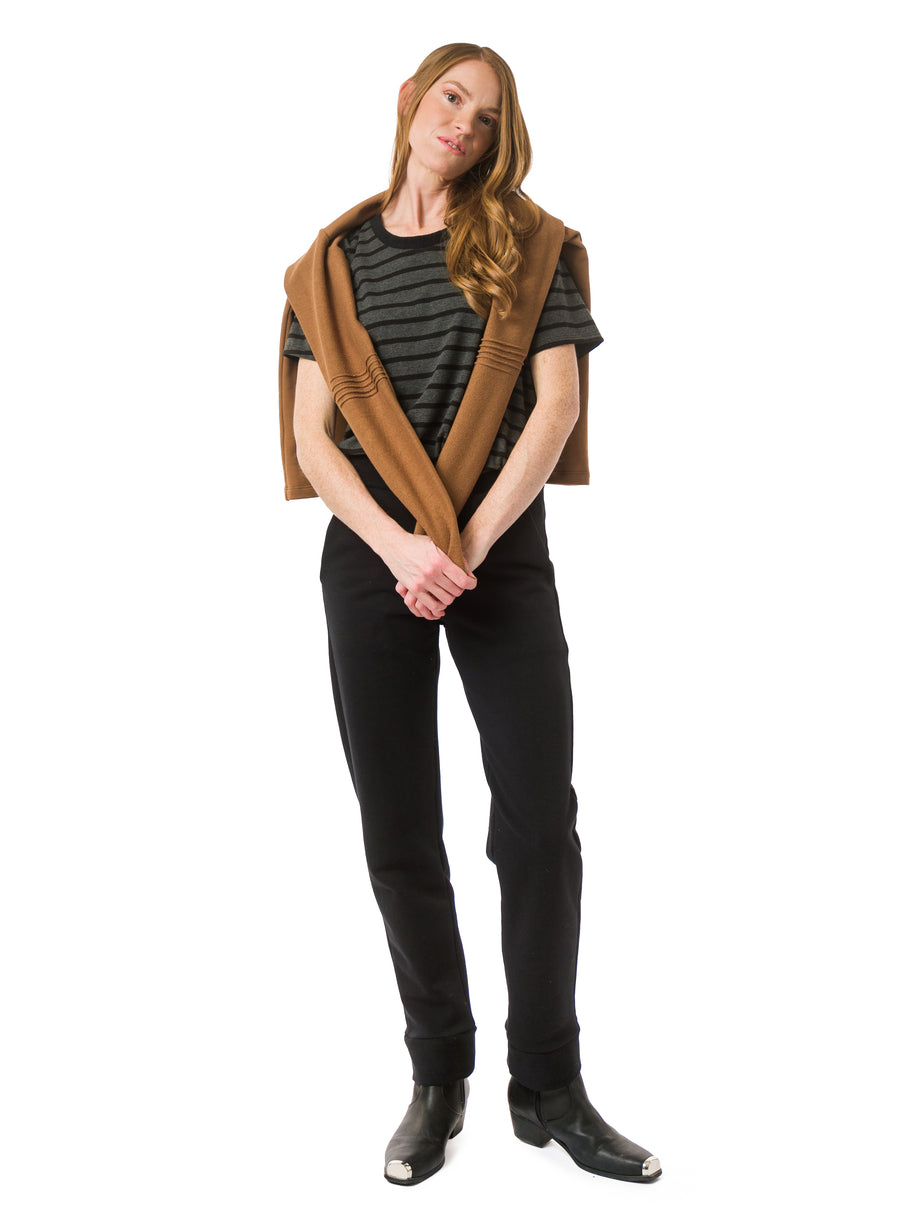 Nutmeg unisex sweater with reverse fabric sleeves and neck band. Pintuck detail on elbow. Styled with Charcoal and Black striped unisex tee and Black unisex trousers.