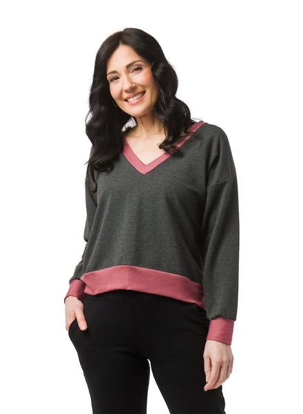Charcoal Grey V-neck sweater with Pink Clay rib accent details on neck band, cuff and hem.