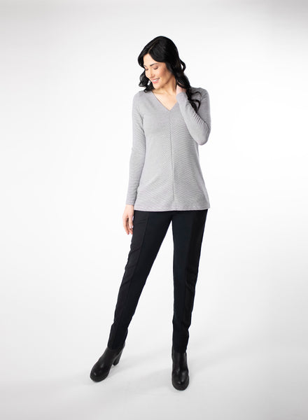 Grey and white striped top with wrist length sleeve. 2-way neckline options. V-neck paired with black fitted pant.