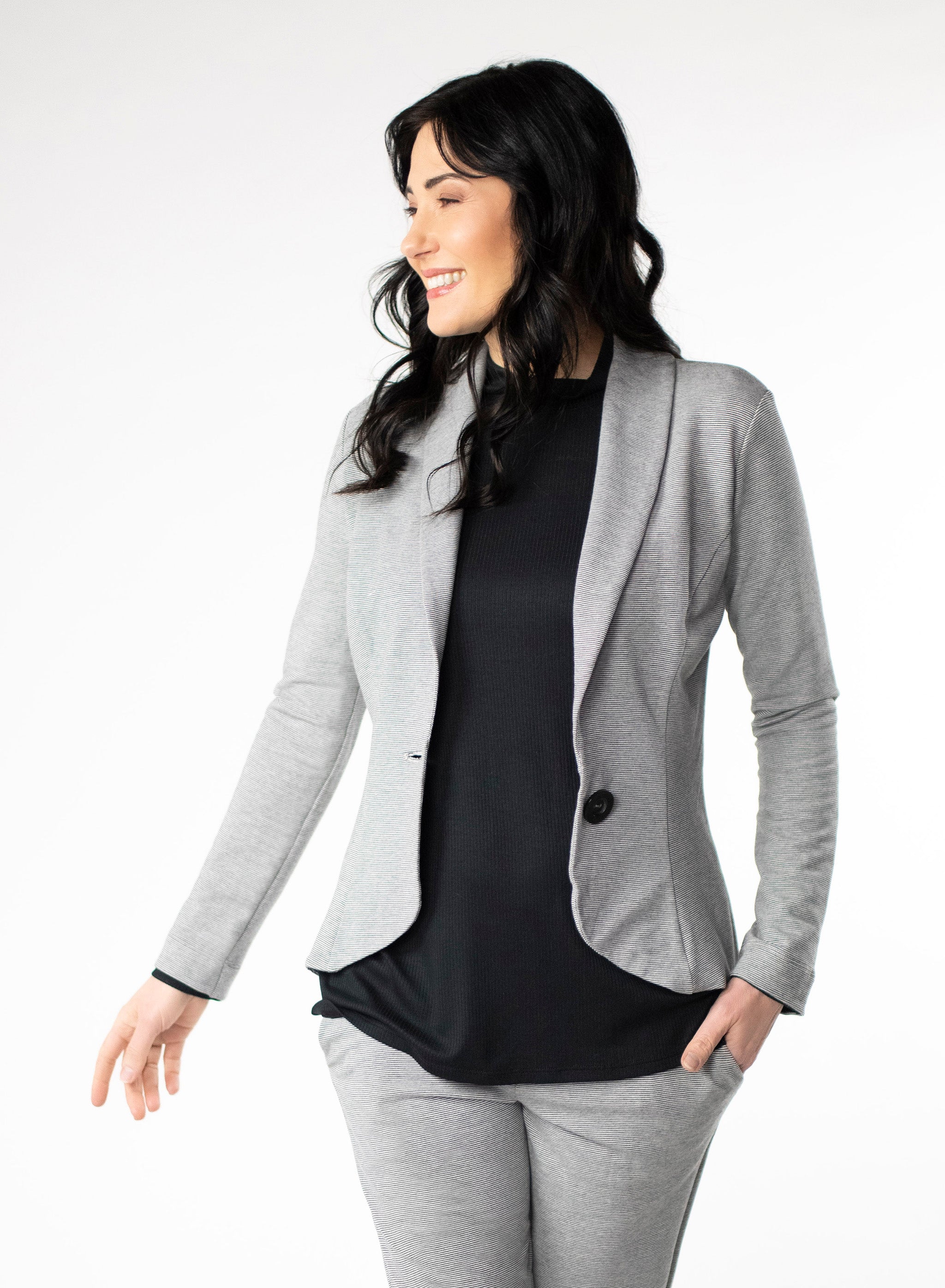 Grey and White stripe Tailored Blazer in Bamboo knit fabric with a wood button at front closure. Styled with black ribbed mock neck.