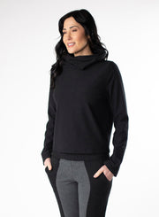 Black Fleece cropped sweater with dual cowl neck and fitted hood. Pleat at centre back hem. Styled with Black and Charcoal fitted pants
