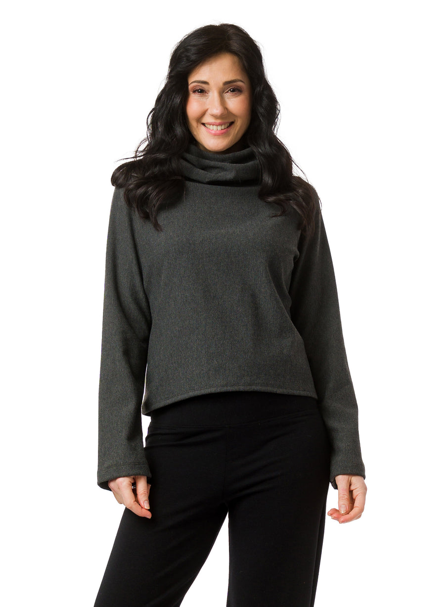 Charcoal Grey Fleece cropped sweater with dual cowl neck and fitted hood. Pleat at centre back hem. 