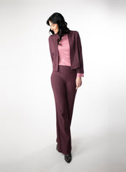Plum Fleece wide leg pants. Wide waistband for support and coverage. Styled with a pink ribbed mock neck and matching fleece cropped cardigan. 