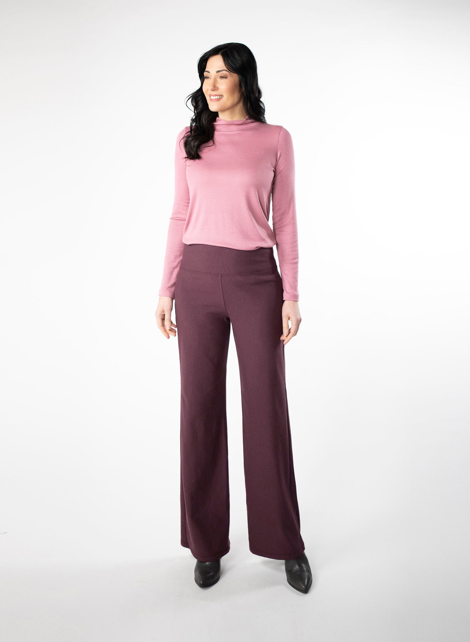 Plum Fleece wide leg pants. Wide waistband for support and coverage. Styled with a pink ribbed mock neck. Bamboo and Cotton Fleece fabric. 