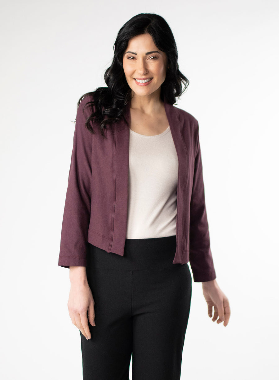 Plum fleece cropped cardigan. Styled with white tee and Black fleece wide leg pants. 