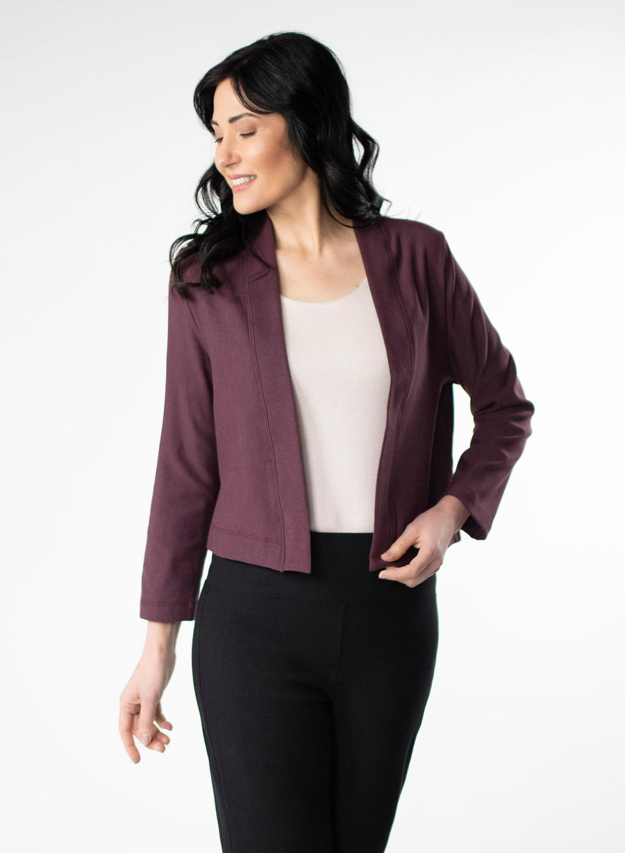 Plum fleece cropped cardigan. Styled with white tee and Black fleece wide leg pants. 