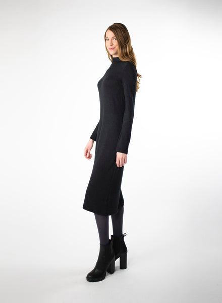 Black mock neck dress with full length sleeves. Dress length ends below the knee. Styled with Charcoal Grey leggings. Tencel Modal blend lux fabric.