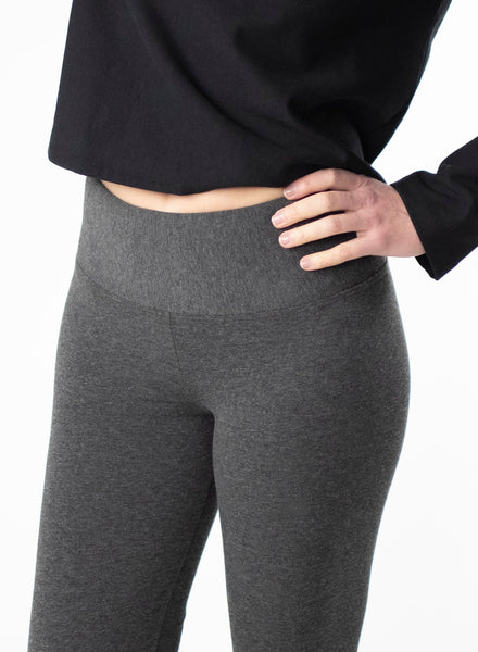 Charcoal Grey bamboo leggings with a wide waistband. Styled with Black cropped sweater.
