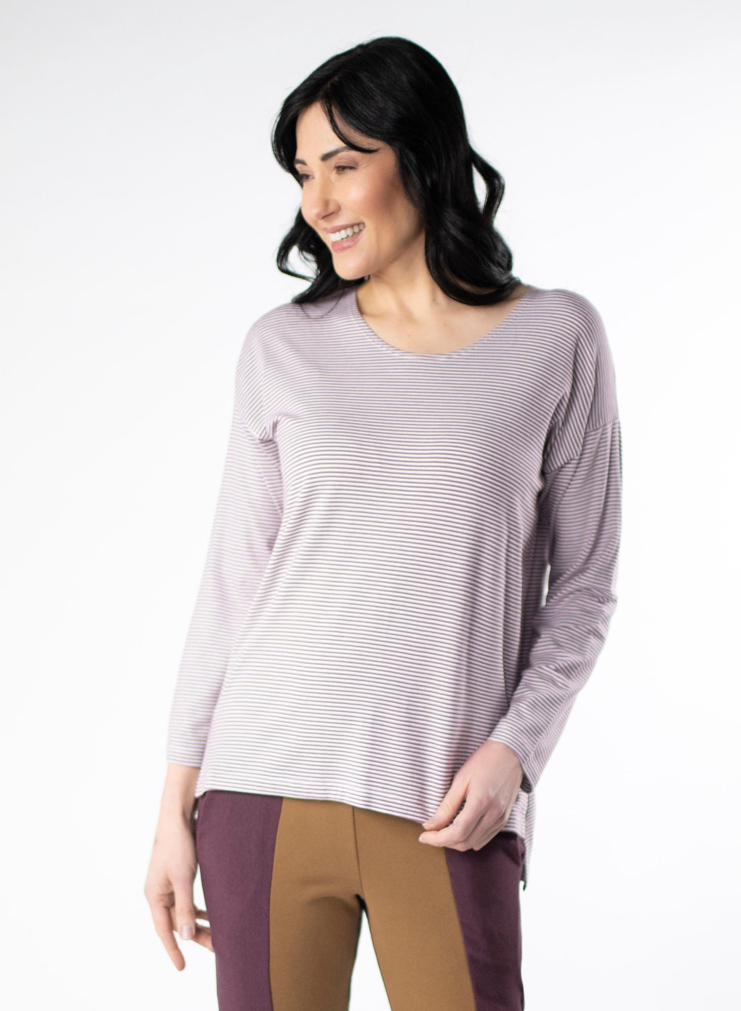 Burgundy and white striped long sleeve top with scoop neck and relaxed fit to the body. Step hem with a small side slit. 