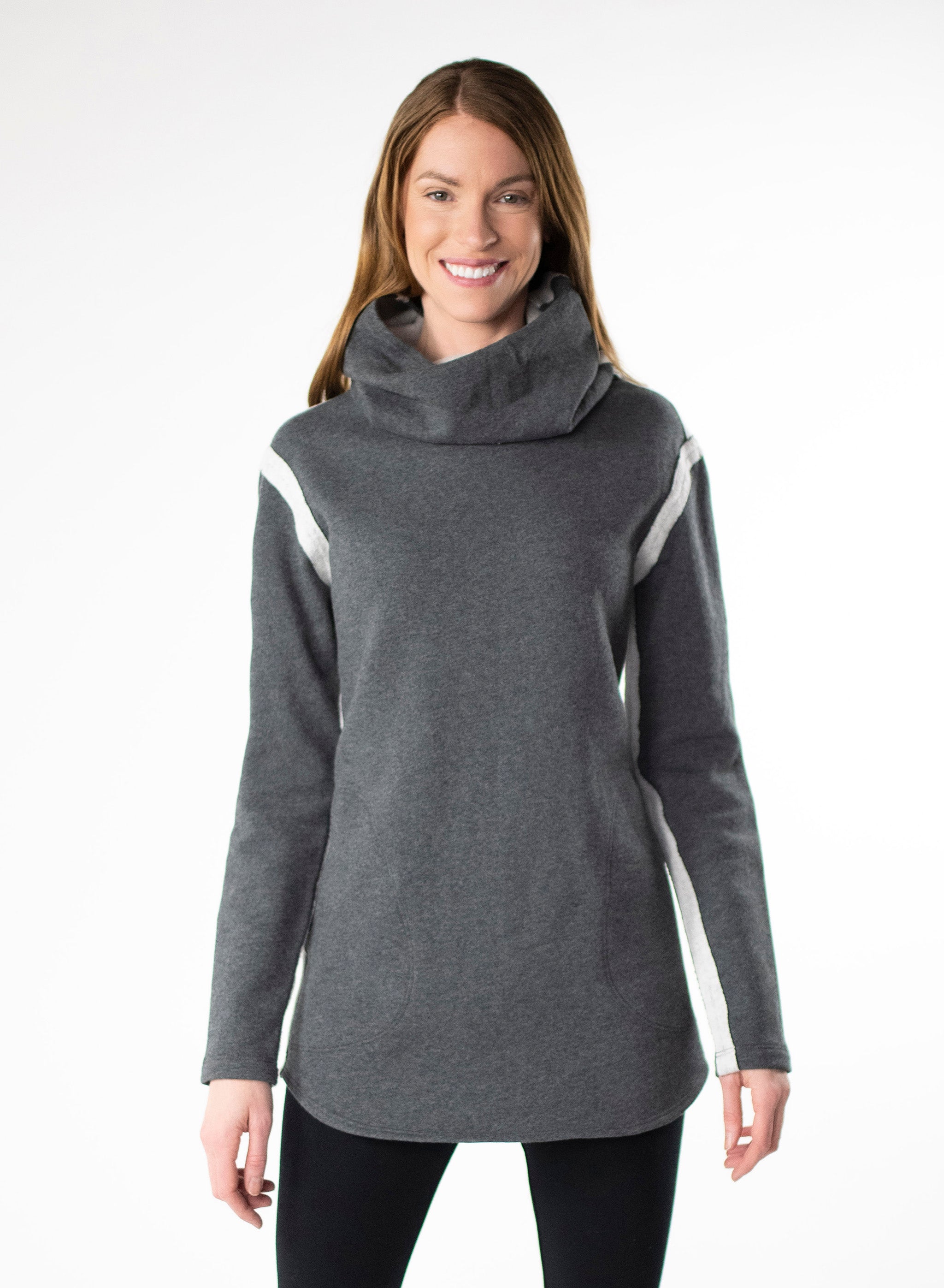 Charcoal Grey organic cotton fleece sweater with side seam pockets and a fitted hood. Reverse fabric details on seams and curved hem.