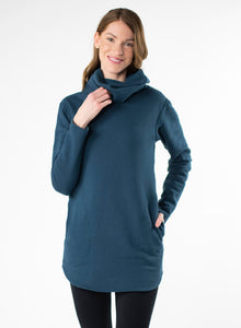 Deep Blue organic cotton fleece sweater with side seam pockets and a fitted hood. Reverse fabric details on seams and curved hem.