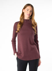 Plum organic cotton waffle knit mock neck. Loose fit to the body.