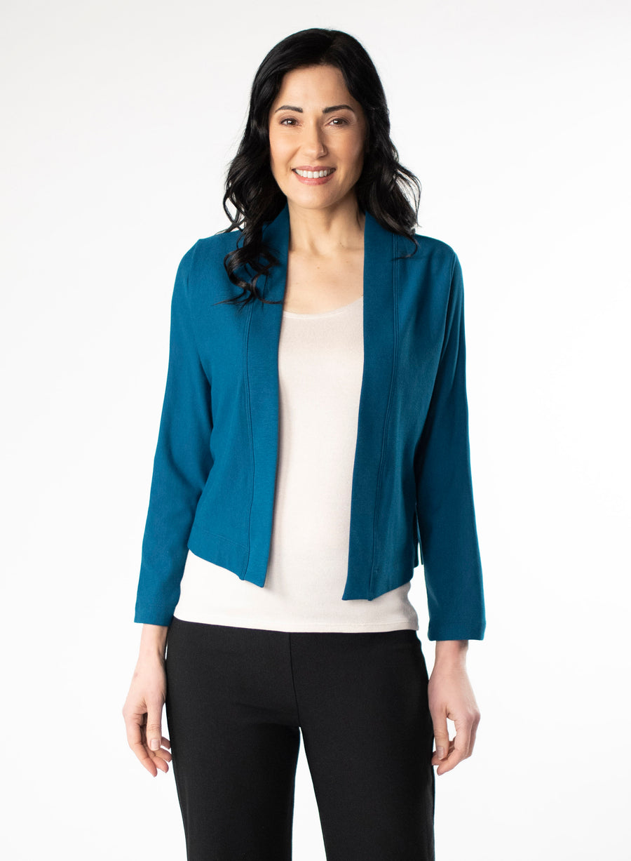 Blue fleece cropped cardigan. Styled with white tee and Black fleece wide leg pants.