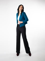 Blue fleece cropped cardigan. Styled with white tee and Black fleece wide leg pants.