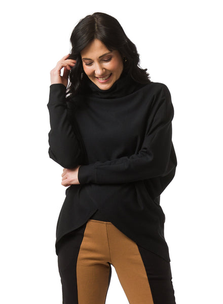 Black fleece sweater with cowl neck and dolman cuffed sleeves. Sweater features a reverse-V drape in front. 