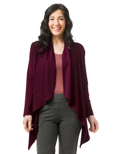 Burgundy open style cardigan with long drape in front and side seam pockets. Styled with fitted tank top and charcoal grey pants