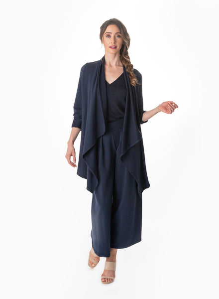 Navy open style cardigan with long drape in front and side seam pockets.