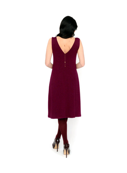 Burgundy reversible neckline tank dress. Two-way neckline showing the V-neck in back. Dress length ends below the knee. Tencel Modal blend lux fabric.