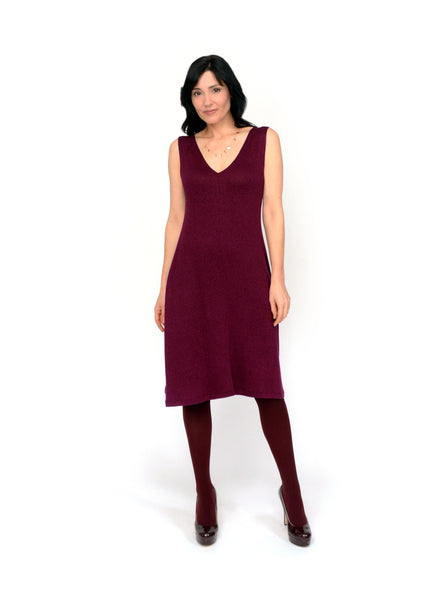 Burgundy reversible neckline tank dress. Two-way neckline showing the V-neck in front. Dress length ends below the knee. Tencel Modal blend lux fabric.