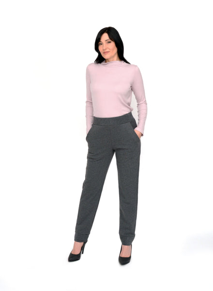 Light Pink ribbed mock neck fitting loose to the body. Styled with Charcoal Grey unisex trousers