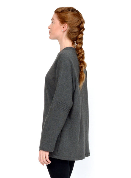 Charcoal Grey unisex sweater with reverse fabric sleeves and neck band. Pintuck detail on elbow.