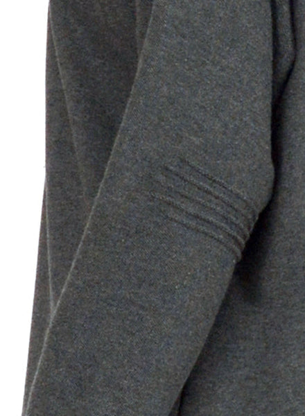 Charcoal grey sweater close up of pintuck detail at elbow